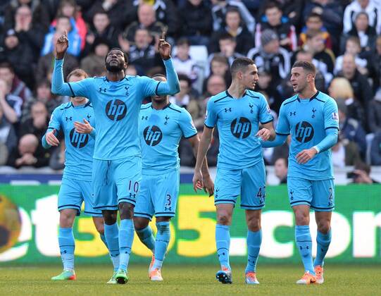 Emmanuel Adebayor of Tottenham celebrates his goal - Barclays Premier League - Swansea City vs Tottenham Hotspur - Liberty Stadium - Swansea - Wales - 19th January 2014 - EDITORIAL USE ONLY. No use with unauthorised audio, video, data, fixture lists, club league logos or live services. Online in-match use limited to 120 images, no video emulation. No use in betting, games or single club league player publications.