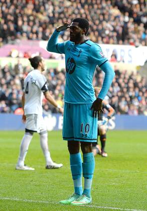 Emmanuel Adebayor of Tottenham celebrates the third goal - Barclays Premier League - Swansea City vs Tottenham Hotspur - Liberty Stadium - Swansea - Wales - 19th January 2014 - EDITORIAL USE ONLY. No use with unauthorised audio, video, data, fixture lists, club league logos or live services. Online in-match use limited to 120 images, no video emulation. No use in betting, games or single club league player publications.