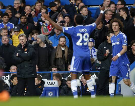 Chelsea s Samuel Eto o celebrates scoring his sides opening goal in front of Manchester United s David Moyes FC Chelsea vs Manchester United (ManU) - Premier League - Stamford Bridge- London - England - 19 01 2014 - EDITORIAL USE ONLY. No use with unauthorised audio, video, data, fixture lists, club league logos or live services. Online in-match use limited to 120 images, no video emulation. No use in betting, games or single club league player publications.
