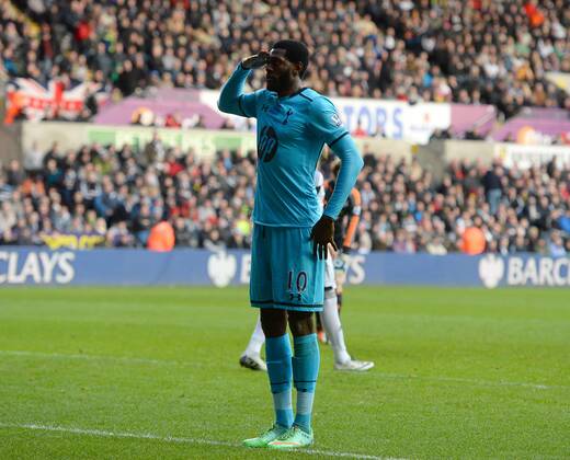 Emmanuel Adebayor of Tottenham celebrates the third goal with a salute - Barclays Premier League - Swansea City vs Tottenham Hotspur - Liberty Stadium - Swansea - Wales - 19th January 2014 - EDITORIAL USE ONLY. No use with unauthorised audio, video, data, fixture lists, club league logos or live services. Online in-match use limited to 120 images, no video emulation. No use in betting, games or single club league player publications.