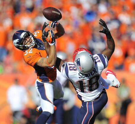 Jan. 18, 2014 - Denver, CO, USA - Denver Broncos cornerback Tony Carter breaks up a pass intended for New England Patriots wide receiver Matthew Slater during the first quarter of the AFC championship game at Sports Authority Field at Mile High in Denver on Sunday, Jan. 19, 2014. The Broncos defeated the Patriots, 26-16. BRONCOS PATRIOTS - ZUMAm67