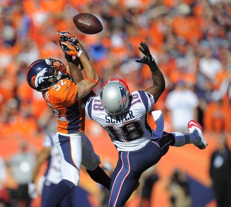 Jan. 18, 2014 - Denver, CO, USA - Denver Broncos cornerback Tony Carter breaks up a pass intended for New England Patriots wide receiver Matthew Slater during the first quarter of the AFC championship game at Sports Authority Field at Mile High in Denver on Sunday, Jan. 19, 2014. The Broncos defeated the Patriots, 26-16. BRONCOS PATRIOTS - ZUMAm67