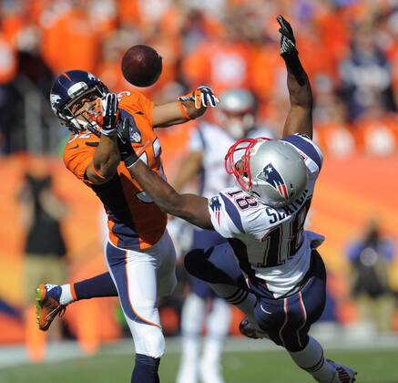 Jan. 18, 2014 - Denver, CO, USA - Denver Broncos cornerback Tony Carter breaks up a pass intended for New England Patriots wide receiver Matthew Slater during the first quarter of the AFC championship game at Sports Authority Field at Mile High in Denver on Sunday, Jan. 19, 2014. The Broncos defeated the Patriots, 26-16. BRONCOS PATRIOTS - ZUMAm67