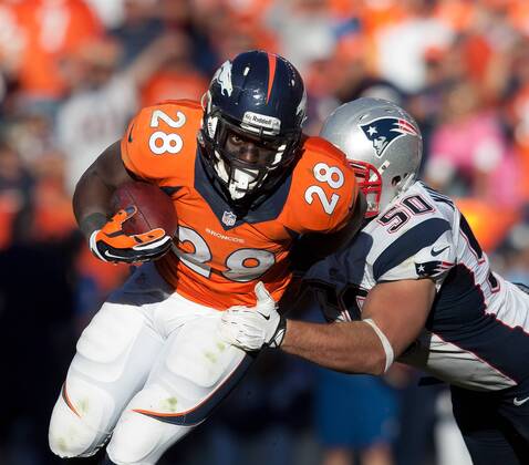 Jan. 19, 2014 - Denver, Colorado, U.S - Broncos RB MONTEE BALL, left, runs for tough yardage against Patriots DL ROB NINKOVICH, right, during the 2nd. half at Sports Authority Field at Mile High during the AFC Championship Game Sunday afternoon. The Broncos beat the Patriots 26-16. NFL American Football Herren USA 2014 - Broncos Win AFC Championship  - ZUMAonc