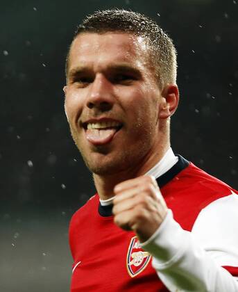 LONDON, Jan. 24, 2014 (Xinhua) -- Lukas Podolski of Arsenal celebrates scoring his second goal during FA Cup Fourth Round match between Arsenal and Coventry City at Emirates Stadium in London, Britain on Jan. 24, 2014. 