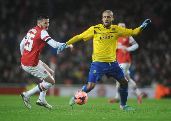 Football - 2013 2014 FA Cup - Fourth Round: Arsenal vs. Coventry City Leon Clarke - Coventry Arsenal s Carl Jenkinson at The Emirates. COLORSPORT ANDREW COWIE