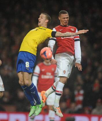 Football - 2013 2014 FA Cup - Fourth Round: Arsenal vs. Coventry City Carl Baker - Coventry Arsenal s Kieran Gibbs at The Emirates. COLORSPORT ANDREW COWIE