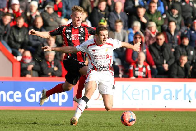Football - 2013 2014 FA Cup - Fourth Round: AFC Bournemouth vs. Liverpool FC Jordan Henderson of Liverpool wins the ball from Bournemouth s Matt Ritchie at Dean Court The Goldsands Stadium Colorsport ShaunxBoggust