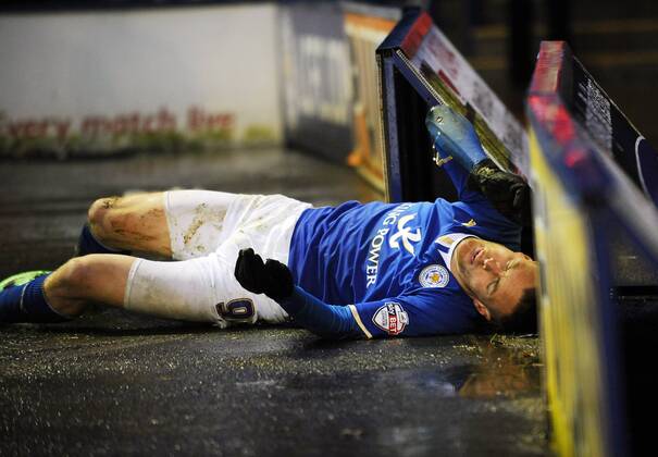 Leicester s Jamie Vardy hits the advertising board during his sides clash with Middlesbrough Sky Bet Championship - Leicester City v Middlesbrough - England - 25th January 2014 - EDITORIAL USE ONLY. No use with unauthorised audio, video, data, fixture lists, club league logos or live services. Online in-match use limited to 120 images, no video emulation. No use in betting, games or single club league player publications.