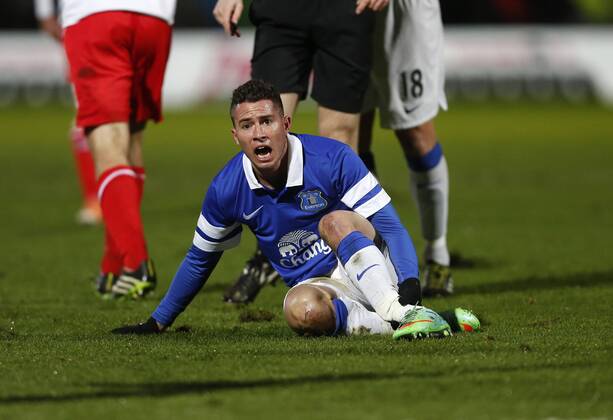 Everton s Bryan Oviedo looks on in shock as he breaks his ankle Stevenage vs Everton - FA Cup Fourth Round - Broadhall Way- Stevenage - England - 25 01 2014 - EDITORIAL USE ONLY. No use with unauthorised audio, video, data, fixture lists, club league logos or live services. Online in-match use limited to 120 images, no video emulation. No use in betting, games or single club league player publications.