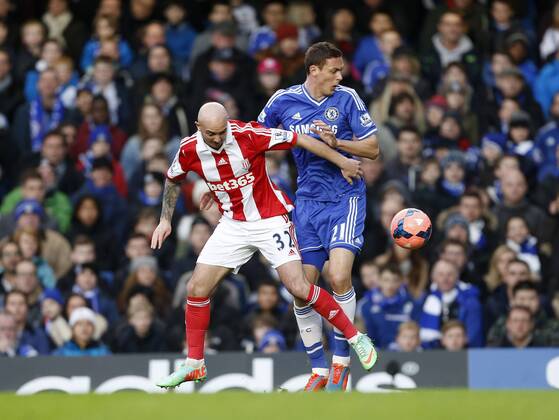 Chelsea s Nemanja Matic tussles with Stoke s Stephen Ireland FC Chelsea vs Stoke City - FA Cup Fourth Round - Stamford Bridge- London - England - 26 01 2014 - Pic DavidxKlein Sportimage EDITORIAL USE ONLY. No use with unauthorised audio, video, data, fixture lists, club league logos or live services. Online in-match use limited to 120 images, no video emulation. No use in betting, games or single club league player publications.