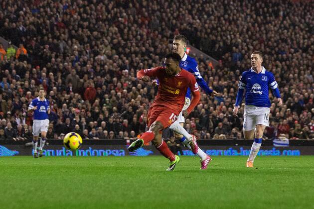 Daniel Sturridge of Liverpool scores his sides second goal - Liverpool FC vs. Everton FC - Barclays Premier League - Anfield - Liverpool - 28 01 2014 EDITORIAL USE ONLY. No use with unauthorised audio, video, data, fixture lists, club league logos or live services. Online in-match use limited to 120 images, no video emulation. No use in betting, games or single club league player publications.