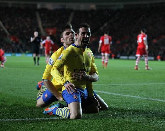 Arsenal s Santi Cazorla celebrates scoring his sides second goal Southampton FC vs Arsenal FC London - Barclays Premier League - St Mary s Stadium - Southampton - England - 28 01 2014 EDITORIAL USE ONLY. No use with unauthorised audio, video, data, fixture lists, club league logos or live services. Online in-match use limited to 120 images, no video emulation. No use in betting, games or single club league player publications.