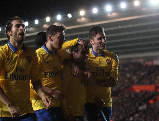 Arsenal s Santi Cazorla celebrates scoring his sides second goal Southampton FC vs Arsenal FC London - Barclays Premier League - St Mary s Stadium - Southampton - England - 28 01 2014 EDITORIAL USE ONLY. No use with unauthorised audio, video, data, fixture lists, club league logos or live services. Online in-match use limited to 120 images, no video emulation. No use in betting, games or single club league player publications.