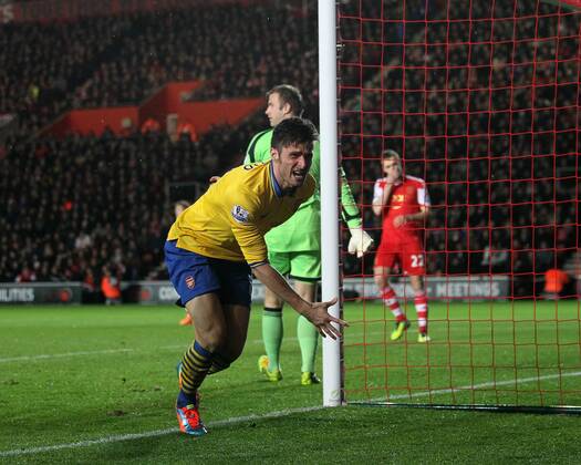 Arsenal s Olivier Giroud celebrates scoring his sides opening goal Southampton FC vs Arsenal FC London - Barclays Premier League - St Mary s Stadium - Southampton - England - 28 01 2014 EDITORIAL USE ONLY. No use with unauthorised audio, video, data, fixture lists, club league logos or live services. Online in-match use limited to 120 images, no video emulation. No use in betting, games or single club league player publications.