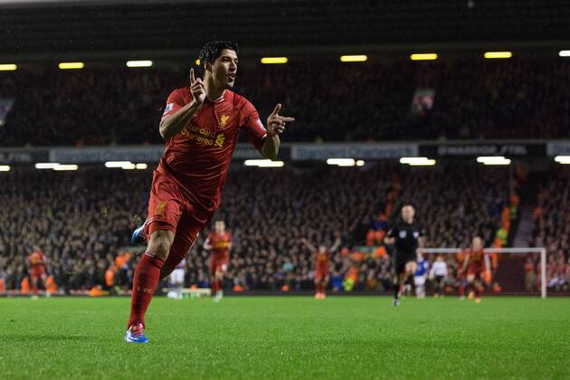 Luis Suarez of Liverpool celebrates scoring his sides fourth goal - Liverpool FC vs. Everton FC - Barclays Premier League - Anfield - Liverpool - 28 01 2014 EDITORIAL USE ONLY. No use with unauthorised audio, video, data, fixture lists, club league logos or live services. Online in-match use limited to 120 images, no video emulation. No use in betting, games or single club league player publications.