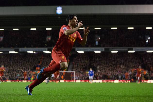Luis Suarez of Liverpool celebrates scoring his sides fourth goal - Liverpool FC vs. Everton FC - Barclays Premier League - Anfield - Liverpool - 28 01 2014 EDITORIAL USE ONLY. No use with unauthorised audio, video, data, fixture lists, club league logos or live services. Online in-match use limited to 120 images, no video emulation. No use in betting, games or single club league player publications.