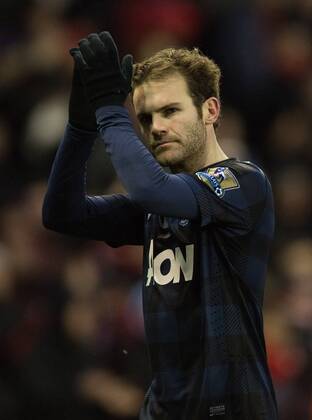 Juan Mata of Manchester United (ManU) applauds the crowd - Stoke City vs. Manchester United (ManU) - Premier League - Britannia Stadium - Stoke - 01 02 2014 Pic PhilipxOldham Sportimage EDITORIAL USE ONLY. No use with unauthorised audio, video, data, fixture lists, club league logos or live services. Online in-match use limited to 120 images, no video emulation. No use in betting, games or single club league player publications.