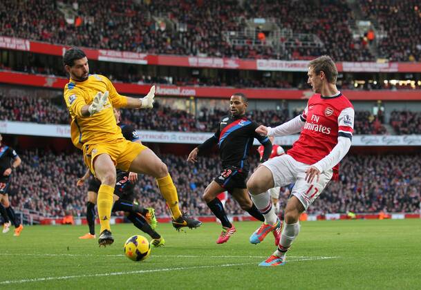 Arsenal s Nacho Monreal sees his shot saved by Crystal Palace s Julian Speroni Arsenal vs Crystal Palace - Premier League - Emirates Stadium - London - England - 02 02 2014 - Pic David Klein Sportimage EDITORIAL USE ONLY. No use with unauthorised audio, video, data, fixture lists, club league logos or live services. Online in-match use limited to 120 images, no video emulation. No use in betting, games or single club league player publications.