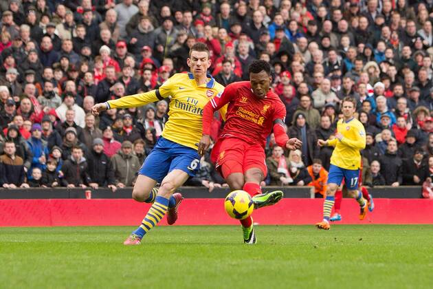 Daniel Sturridge of Liverpool scores his sides fourth goal - Liverpool vs. Arsenal - Barclays Premier League - Anfield - Liverpool - 08 02 2014 Pic Philip Oldham Sportimage EDITORIAL USE ONLY. No use with unauthorised audio, video, data, fixture lists, club league logos or live services. Online in-match use limited to 120 images, no video emulation. No use in betting, games or single club league player publications.