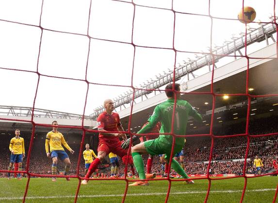Martin Skrtel of Liverpool scores the opening goal - Liverpool FC vs. Arsenal FC London - Barclays Premier League - Anfield - Liverpool - 08 02 2014 - EDITORIAL USE ONLY. No use with unauthorised audio, video, data, fixture lists, club league logos or live services. Online in-match use limited to 120 images, no video emulation. No use in betting, games or single club league player publications.