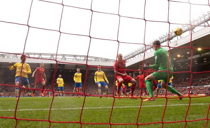 Martin Skrtel of Liverpool scores the opening goal - Liverpool FC vs. Arsenal FC London - Barclays Premier League - Anfield - Liverpool - 08 02 2014 - EDITORIAL USE ONLY. No use with unauthorised audio, video, data, fixture lists, club league logos or live services. Online in-match use limited to 120 images, no video emulation. No use in betting, games or single club league player publications.