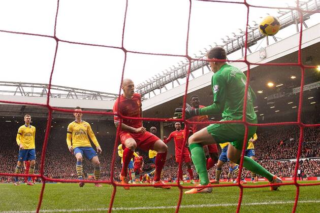 Martin Skrtel of Liverpool scores the opening goal - Liverpool FC vs. Arsenal FC London - Barclays Premier League - Anfield - Liverpool - 08 02 2014 - EDITORIAL USE ONLY. No use with unauthorised audio, video, data, fixture lists, club league logos or live services. Online in-match use limited to 120 images, no video emulation. No use in betting, games or single club league player publications.