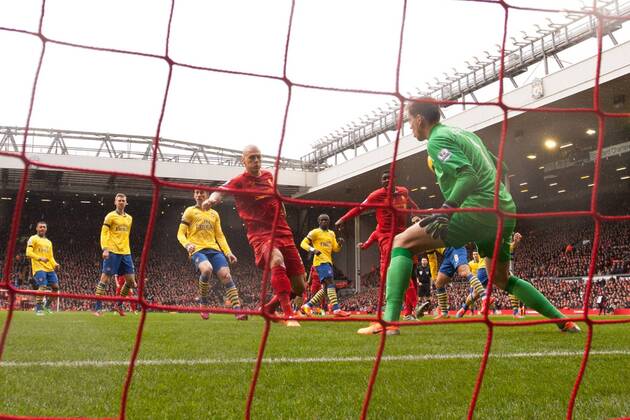 Martin Skrtel of Liverpool scores the opening goal - Liverpool FC vs. Arsenal FC London - Barclays Premier League - Anfield - Liverpool - 08 02 2014 - EDITORIAL USE ONLY. No use with unauthorised audio, video, data, fixture lists, club league logos or live services. Online in-match use limited to 120 images, no video emulation. No use in betting, games or single club league player publications.