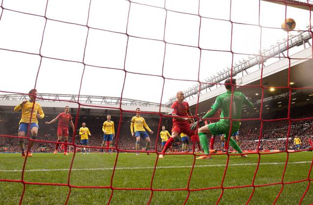 Martin Skrtel of Liverpool scores the opening goal - Liverpool FC vs. Arsenal FC London - Barclays Premier League - Anfield - Liverpool - 08 02 2014 - EDITORIAL USE ONLY. No use with unauthorised audio, video, data, fixture lists, club league logos or live services. Online in-match use limited to 120 images, no video emulation. No use in betting, games or single club league player publications.