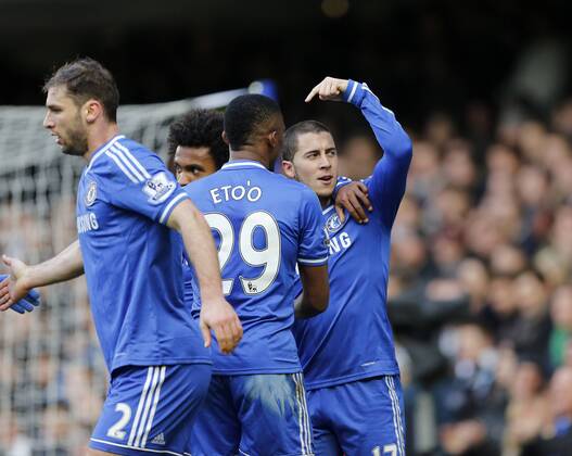 Chelsea s Eden Hazard celebrates scoring his sides second goal with Samuel Eto o Chelsea vs Newcastle United - Premier League - Stamford Bridge - London - England - 08 02 2014 - Pic David Klein Sportimage EDITORIAL USE ONLY. No use with unauthorised audio, video, data, fixture lists, club league logos or live services. Online in-match use limited to 120 images, no video emulation. No use in betting, games or single club league player publications.