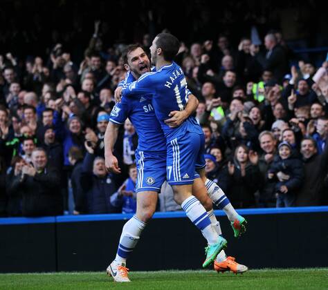 Chelsea s Eden Hazard celebrates scoring his sides opening goal with Branislav Ivanovic Chelsea vs Newcastle United - Premier League - Stamford Bridge - London - England - 08 02 2014 - Pic David Klein Sportimage EDITORIAL USE ONLY. No use with unauthorised audio, video, data, fixture lists, club league logos or live services. Online in-match use limited to 120 images, no video emulation. No use in betting, games or single club league player publications.