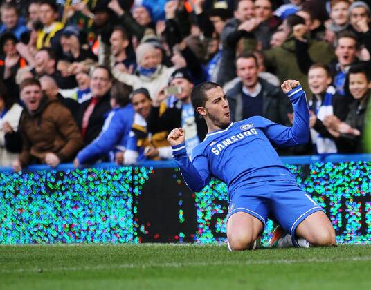 Chelsea s Eden Hazard celebrates scoring his sides second goal Chelsea vs Newcastle United - Premier League - Stamford Bridge - London - England - 08 02 2014 - Pic David Klein Sportimage EDITORIAL USE ONLY. No use with unauthorised audio, video, data, fixture lists, club league logos or live services. Online in-match use limited to 120 images, no video emulation. No use in betting, games or single club league player publications.