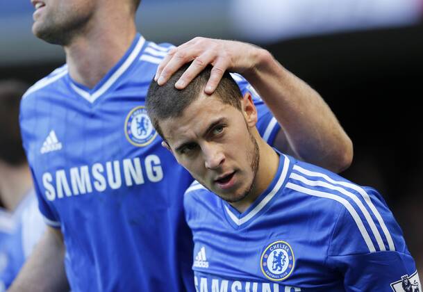 Chelsea s Eden Hazard celebrates scoring his sides opening goal Chelsea vs Newcastle United - Premier League - Stamford Bridge - London - England - 08 02 2014 - Pic David Klein Sportimage EDITORIAL USE ONLY. No use with unauthorised audio, video, data, fixture lists, club league logos or live services. Online in-match use limited to 120 images, no video emulation. No use in betting, games or single club league player publications.