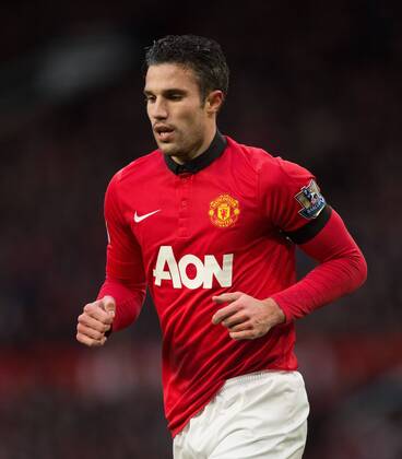 Robin van Persie of Manchester United - Manchester United vs. Fulham - Barclays Premier League - Old Trafford - Manchester - 09 02 2014 Pic Philip Oldham Sportimage EDITORIAL USE ONLY. No use with unauthorised audio, video, data, fixture lists, club league logos or live services. Online in-match use limited to 120 images, no video emulation. No use in betting, games or single club league player publications.