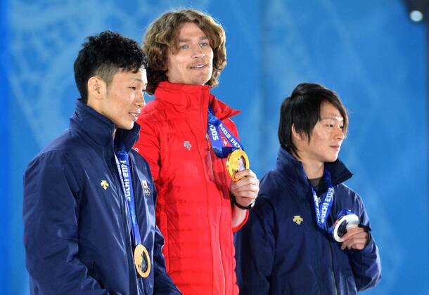 From left to right, silver medalist, Japan s Ayumu Hirano, Gold medalist, Switzerland s Louri Podladtchikov and bronze medalist, Japan s Taku Hiraoka, pose during the victory ceremony for men s snowboard halfpipe, at the Sochi 2014 Winter Olympics on February 12, 2014 in Sochi, Russia.  OLY20140212352