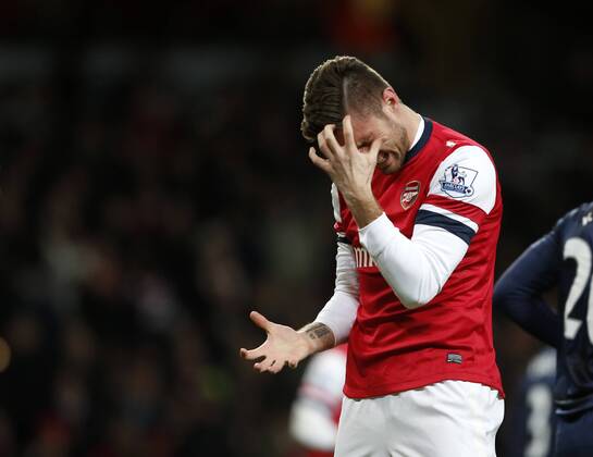 Arsenal s Olivier Giroud looks on dejected after a missed chance Arsenal London s vs Manchester United (ManU) - Premier League - Emirates Stadium - London - England - 12 02 2014 - Pic DavidKlein Sportimage EDITORIAL USE ONLY. No use with unauthorised audio, video, data, fixture lists, club league logos or live services. Online in-match use limited to 120 images, no video emulation. No use in betting, games or single club league player publications.