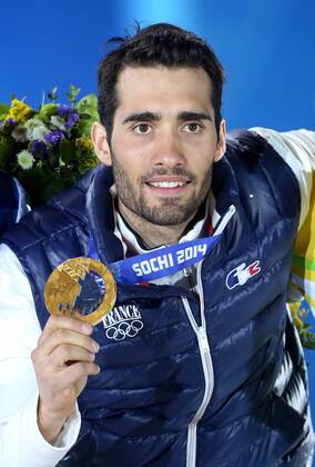 OLYMPIA - Olympische Spiele 2014 SOTSCHI,RUSSLAND,14.FEB.14 - DIVERS, OLYMPIA, BIATHLON- Olympische Winterspiele Sotschi 2014, Siegerehrung, Medaillenvergabe am Medal Plaza, 20km Einzel der Herren. Bild zeigt Martin Fourcade (FRA). Keywords: Medaille. 