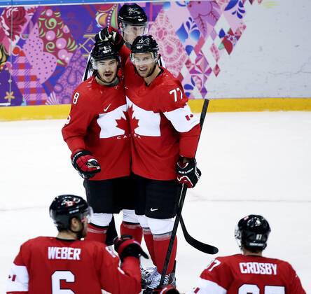 Feb. 16, 2014 - Sochi, Sochi, Russia - Team Canada s Drew Doughty ( 8) celebrates his first period goal against Team Finland with teammates Jeff Carter ( 77), Shea Weber ( 6) and Sidney Crosby ( 87) during their men s ice hockey game at the Bolshoy Ice Dome during the Sochi 2014 Winter Olympics in Sochi, Russia, on Sunday Feb. 16, 2014. Al Charest Calgary Sun QMI Agency OLY2014 Team Canada vs Team Finland at the Sochi 2014 Winter Olympics - ZUMAq06