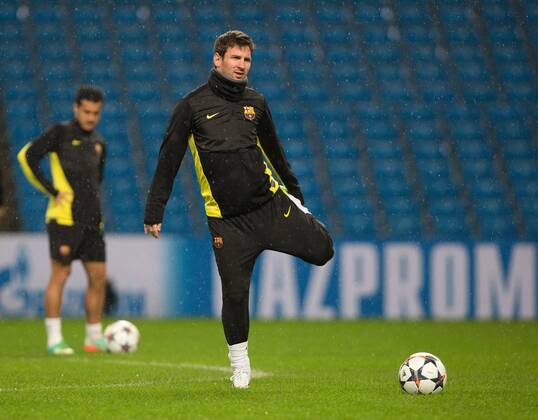 Lionel Messi of Barcelona during training - UEFA Champions League First Knockout Round - Manchester City vs Barcelona - Etihad Stadium - Manchester - England - 17th February 2014 - Picture Phil Oldham Sportimage EDITORIAL USE ONLY. No use with unauthorised audio, video, data, fixture lists, club league logos or live services. Online in-match use limited to 120 images, no video emulation. No use in betting, games or single club league player publications.