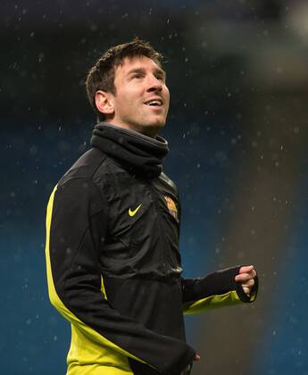 Lionel Messi of Barcelona during training - UEFA Champions League First Knockout Round - Manchester City vs Barcelona - Etihad Stadium - Manchester - England - 17th February 2014 - Picture Phil Oldham Sportimage EDITORIAL USE ONLY. No use with unauthorised audio, video, data, fixture lists, club league logos or live services. Online in-match use limited to 120 images, no video emulation. No use in betting, games or single club league player publications.