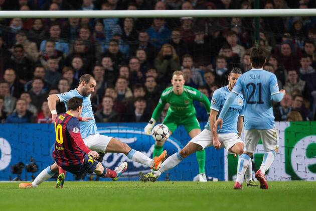 Lionel Messi of Barcelona sends a shot over the bar - UEFA Champions League First Knockout Round - Manchester City vs Barcelona - Etihad Stadium - Manchester - England - 18th February 2014 - Picture Phil Oldham Sportimage EDITORIAL USE ONLY. No use with unauthorised audio, video, data, fixture lists, club league logos or live services. Online in-match use limited to 120 images, no video emulation. No use in betting, games or single club league player publications.