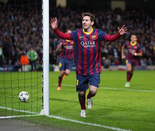 Lionel Messi of Barcelona celebrates his opening goal - UEFA Champions League First Knockout Round - Manchester City vs Barcelona - Etihad Stadium - Manchester - England - 18th February 2014 - Picture Phil Oldham Sportimage EDITORIAL USE ONLY. No use with unauthorised audio, video, data, fixture lists, club league logos or live services. Online in-match use limited to 120 images, no video emulation. No use in betting, games or single club league player publications.