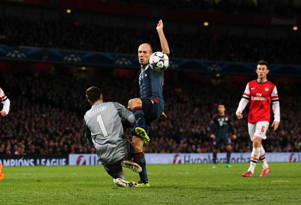 Arsenal s Wojciech Szczesny gets sent off for this foul on Munich s Arjen Robben - FC Arsenal London vs FC Bayern Munich - UEFA Champions League - Emirates Stadium - London - England - 19 02 2014 - EDITORIAL USE ONLY. No use with unauthorised audio, video, data, fixture lists, club league logos or live services. Online in-match use limited to 120 images, no video emulation. No use in betting, games or single club league player publications.