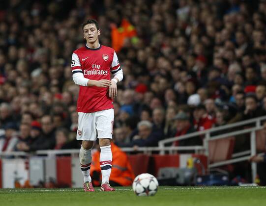 Arsenal s Mesut Ozil looks on dejected Arsenal vs FC Bayern Munich - UEFA Champions League - Emirates Stadium - London - England - 19 02 2014 - Pic David Klein Sportimage EDITORIAL USE ONLY. No use with unauthorised audio, video, data, fixture lists, club league logos or live services. Online in-match use limited to 120 images, no video emulation. No use in betting, games or single club league player publications.