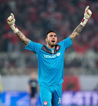 Roberto of Olympiacos celebrates - UEFA Champions League First Knockout Round - Olympiacos vs. Manchester United - Karaiskakh Stadium - Athens - Greece - 25th February 2014 - EDITORIAL USE ONLY. No use with unauthorised audio, video, data, fixture lists, club league logos or live services. Online in-match use limited to 120 images, no video emulation. No use in betting, games or single club league player publications.