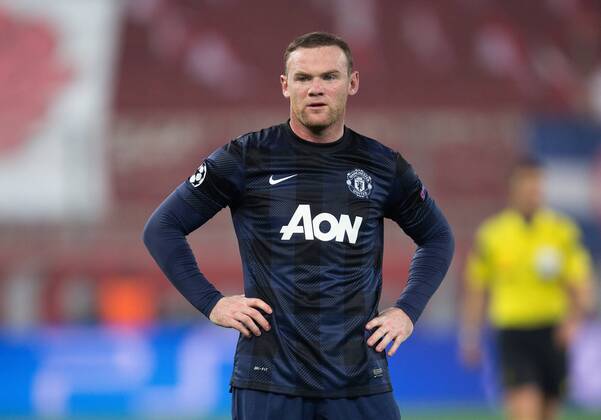 Wayne Rooney of Manchester United looks dejected - UEFA Champions League First Knockout Round - Olympiacos vs. Manchester United - Karaiskakh Stadium - Athens - Greece - 25th February 2014 - EDITORIAL USE ONLY. No use with unauthorised audio, video, data, fixture lists, club league logos or live services. Online in-match use limited to 120 images, no video emulation. No use in betting, games or single club league player publications.