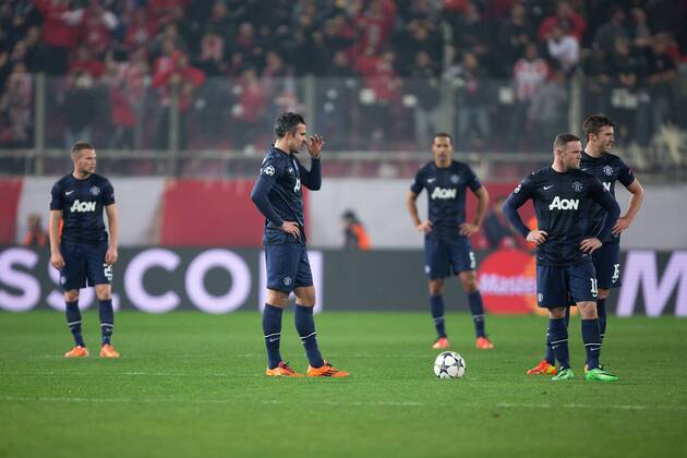 Manchester United are left looking dejected following the second goal - UEFA Champions League First Knockout Round - Olympiacos vs. Manchester United - Karaiskakh Stadium - Athens - Greece - 25th February 2014 - Picture Philip Oldham Sportimage EDITORIAL USE ONLY. No use with unauthorised audio, video, data, fixture lists, club league logos or live services. Online in-match use limited to 120 images, no video emulation. No use in betting, games or single club league player publications.