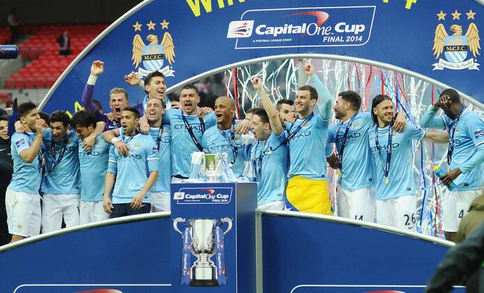 Football - 2014 Capital One League Cup Final - Manchester City - City s team celebrate with the trophy at Wembley. 