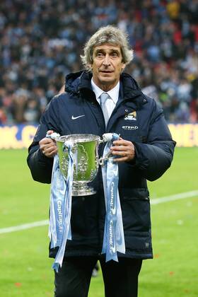 Manchester City Manager, Manuel Pellegrini with the trophy - Manchester City vs AFC Sunderland FC - League Cup Final - Wembley Stadium - London - 2nd March 2014 - EDITORIAL USE ONLY. No use with unauthorised audio, video, data, fixture lists, club league logos or live services. Online in-match use limited to 120 images, no video emulation. No use in betting, games or single club league player publications.