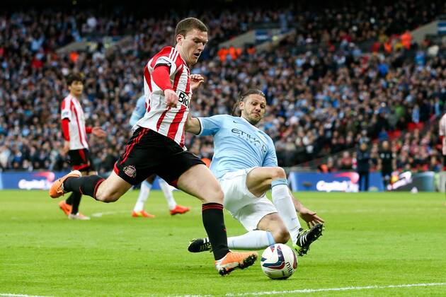 Sunderland s Craig Gardner and Manchester City s Martin Demichelis - Manchester City vs Sunderland - League Cup Final - Wembley Stadium - London - 2nd March 2014 - Pic Charlie Forgham-Bailey Sportimage EDITORIAL USE ONLY. No use with unauthorised audio, video, data, fixture lists, club league logos or live services. Online in-match use limited to 120 images, no video emulation. No use in betting, games or single club league player publications.